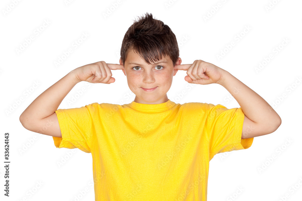 Funny child with yellow t-shirt covering ears Funny child with yellow t-shirt covering ears