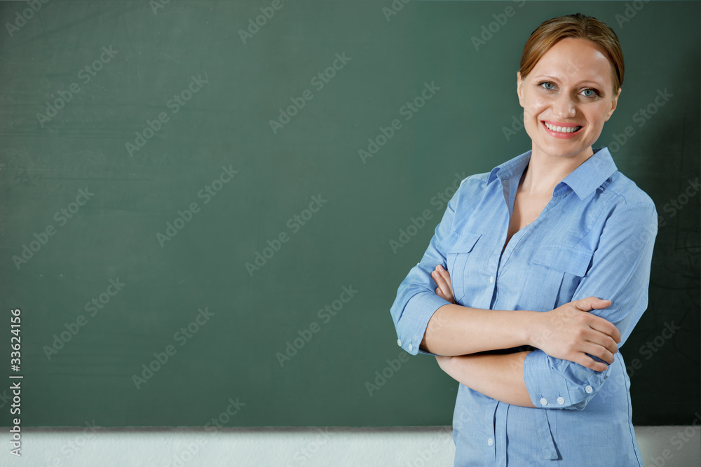 attractive teacher or student at the blackboard