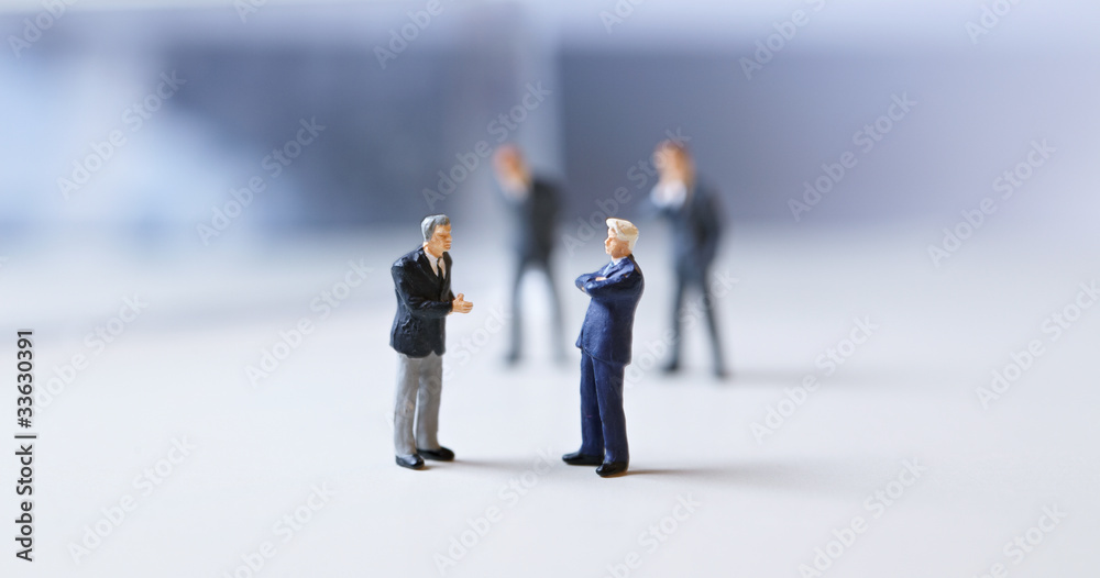 Miniature figurines of successful business team. Miniature figurines of successful business team.