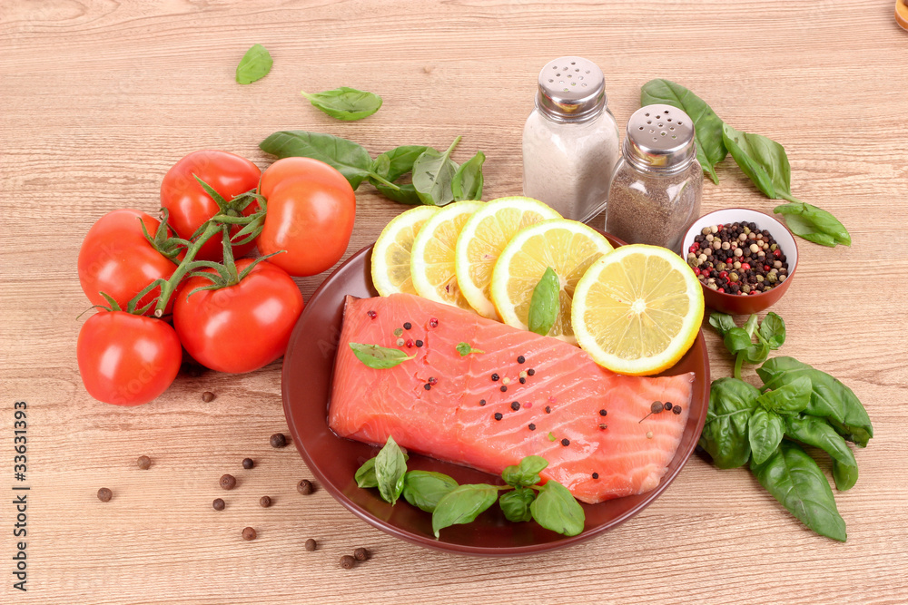 Red fish, lemon, pepper and tomato Red fish, lemon, pepper and tomato