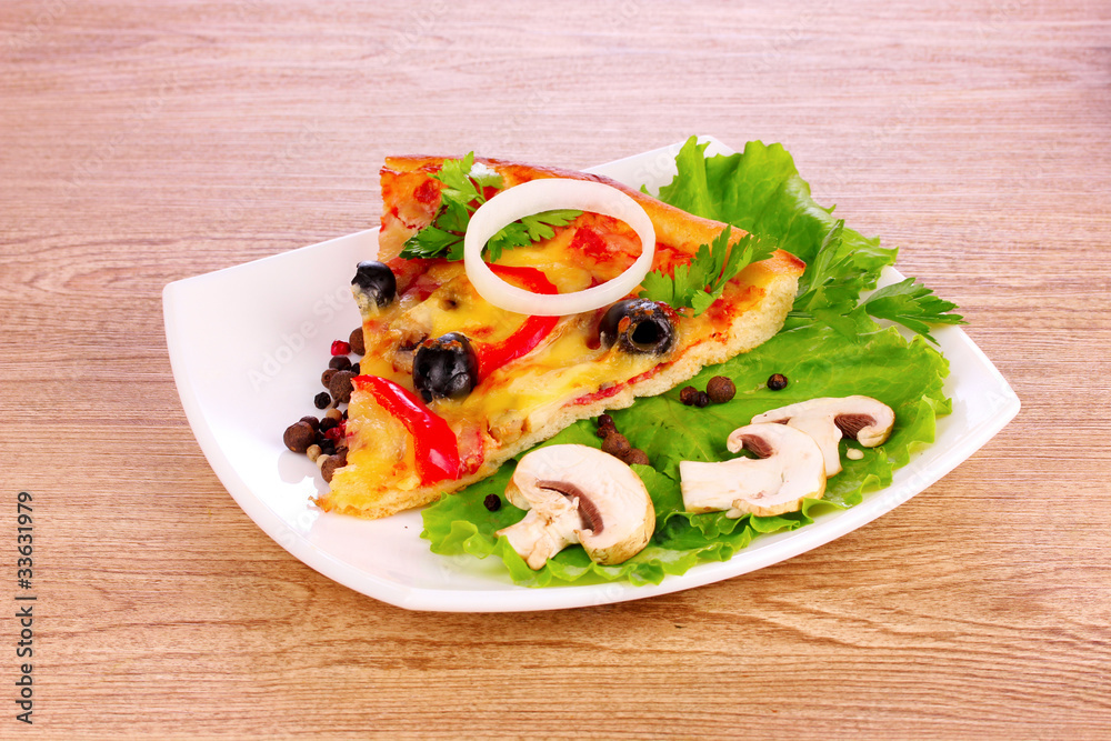 tasty pizza with olives on a wooden background tasty pizza with olives on a wooden background