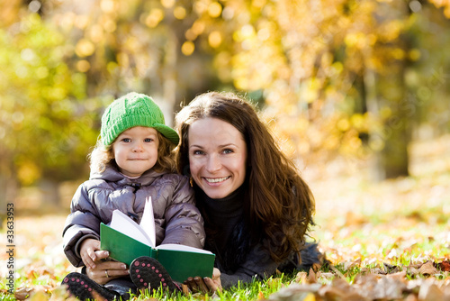 Woman and child having fun photo