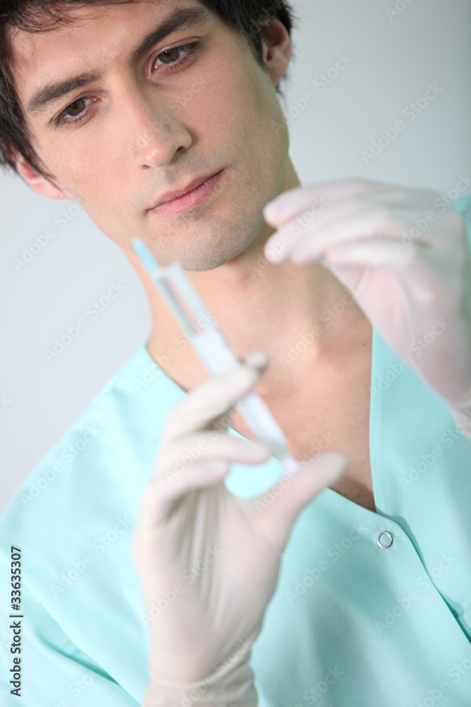 Nurse holding injection Nurse holding injection