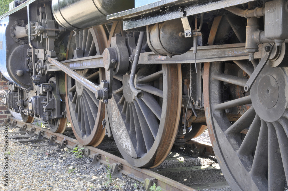 Old steam engine wheels & pistons