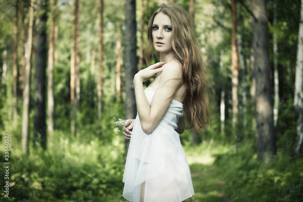 Portrait of romantic woman at fairy forest Portrait of romantic woman at fairy forest