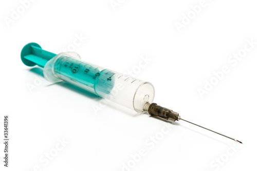 Dirty used glass syringe