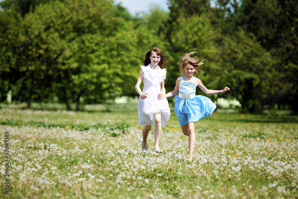 two girls playing in the park