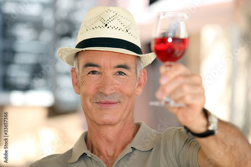 Принти на полотні old man raising a glass of claret