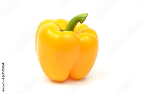 Fresh yellow paprika isolated on white background