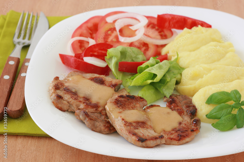 Fried pork with sauce and potato Fried pork with sauce and potato