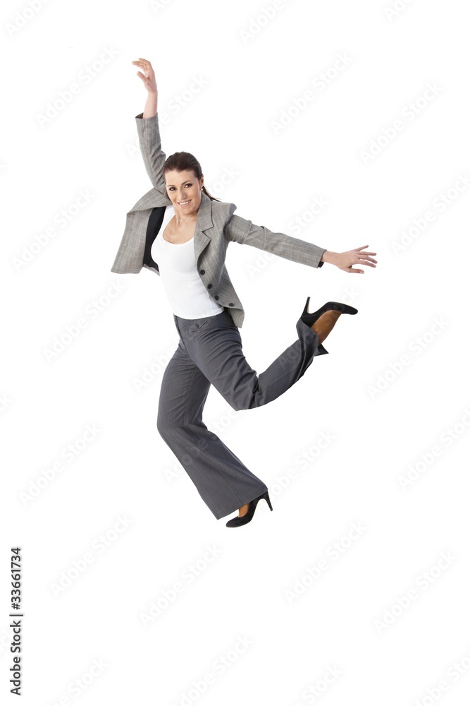 Jumping elegant woman smiling