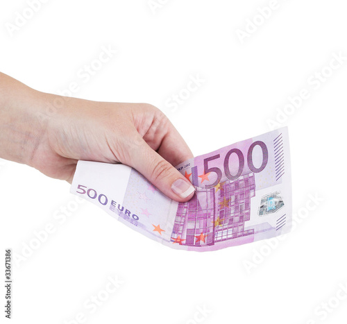 The female hand holds euro