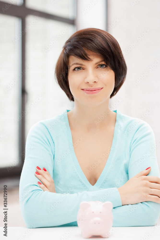 lovely woman with piggy bank lovely woman with piggy bank