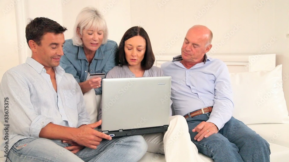 Senior people with couple doing shopping online Senior people with couple doing shopping online