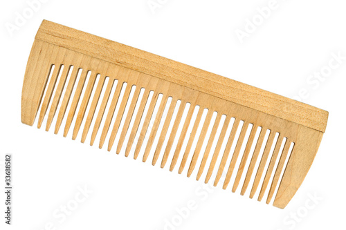 Wooden comb isolated on white background