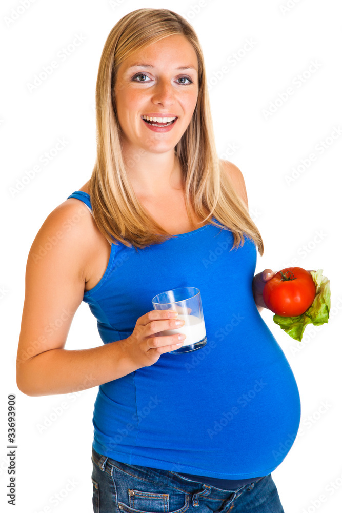 Pregnant woman with vegetables, isolated on white Pregnant woman with vegetables, isolated on white