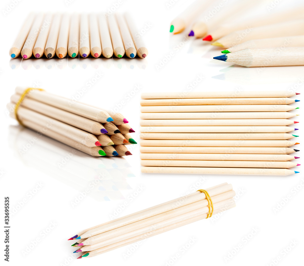 Fototapeta premium many colored pencils in row over white background