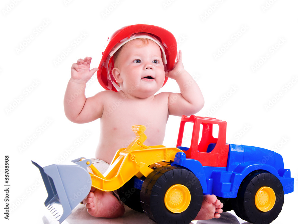 little boy  with a big car