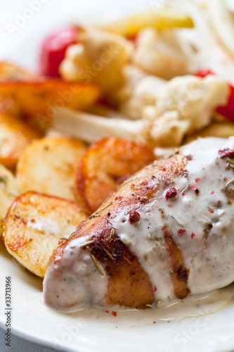 Roasted chicken breast with roasted potatoes