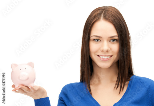 lovely woman with piggy bank