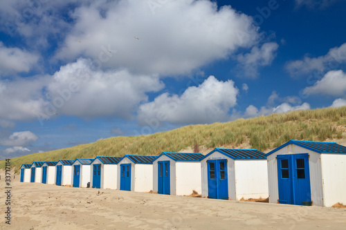 A row of cabins on the beach