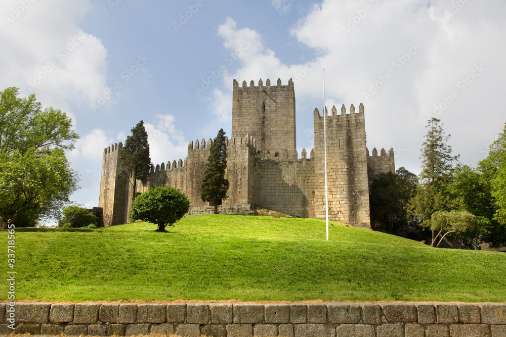 Guimaraes Castle, and surrounding park, in the north of Portugal Guimaraes Castle, and surrounding park, in the north of Portugal