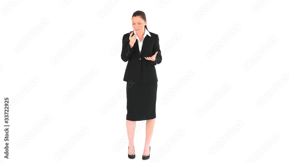 Upset businesswoman telephoning Upset businesswoman telephoning