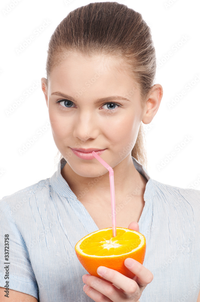 Pretty young woman with half orange Pretty young woman with half orange