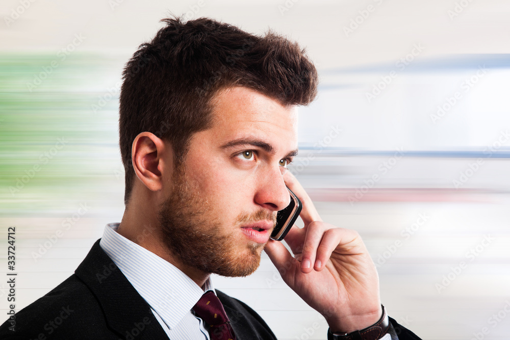 Executive talking at phone