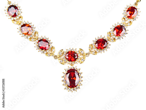 Photo gold necklace with gems isolated