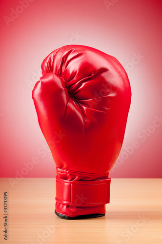 Red boxing gloves on the background © Elnur