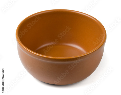 Empty brown clay bowl isolated on white