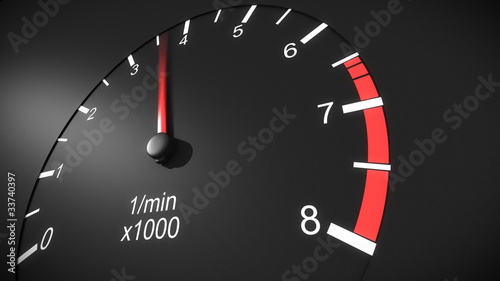 Car tachometer and moving pointer on it. HD. photo