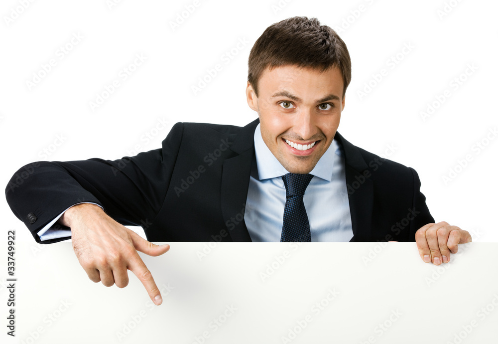 Happy business man showing blank signboard, isolated Happy business man showing blank signboard, isolated