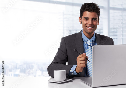 young successful business man at office