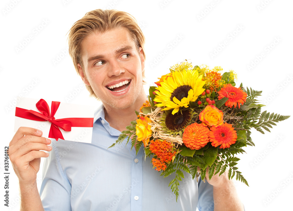 attraktiver mann mit blumenstrauss und gutschein attraktiver mann mit blumenstrauss und gutschein
