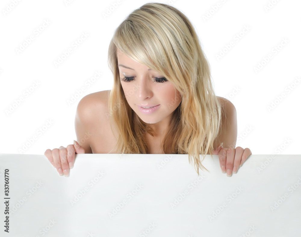 Woman holding a blank billboard Woman holding a blank billboard