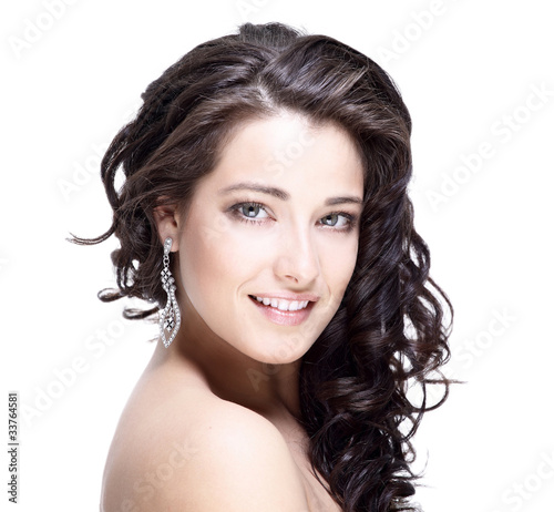 Beautiful face of young woman with clean skin