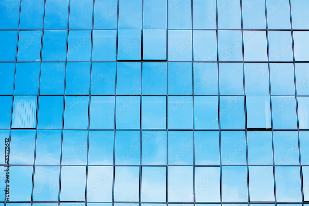 background of the glass modern office building background of the glass modern office building