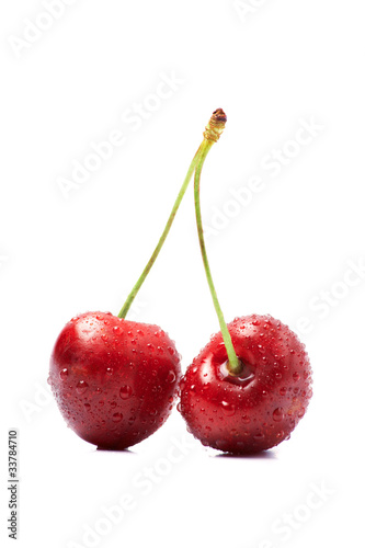 Two cherry in dew