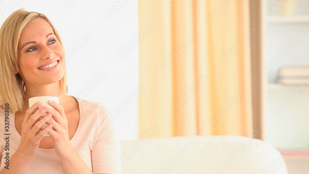 Fair-haired woman drinking coffee Fair-haired woman drinking coffee
