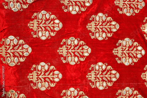 Red vintage silk fabric , textile , antique art ,Rajasthan, royal India