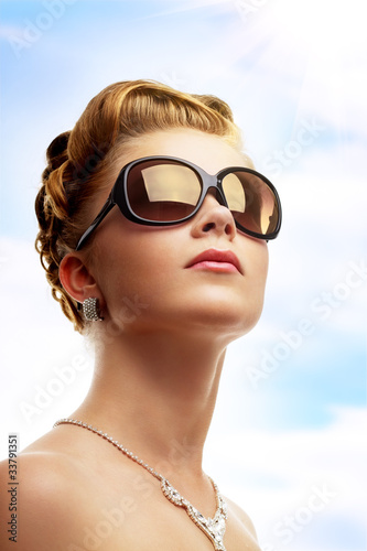 Young woman wearing sunglasses