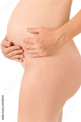 Pregnant woman is holding her belly body part