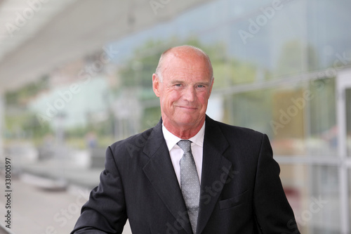 Portrait of smiling mature businessman © goodluz