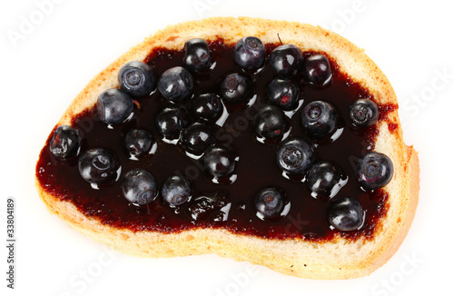 yummy toast with jam and blueberries isolated on white
