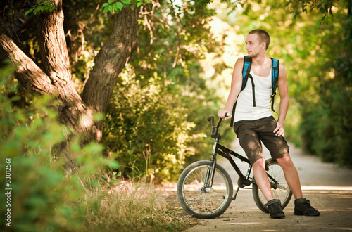 Young man on bike © Evgeniya Grande