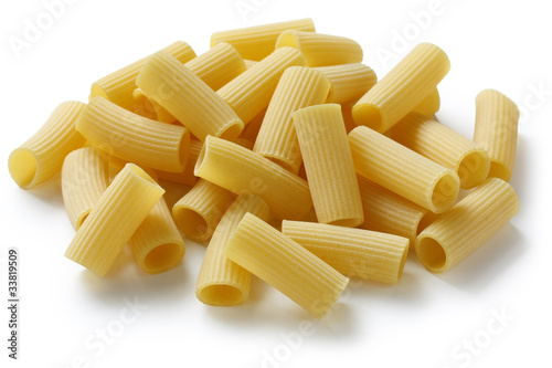 rigatoni , uncooked tube pasta , on white background