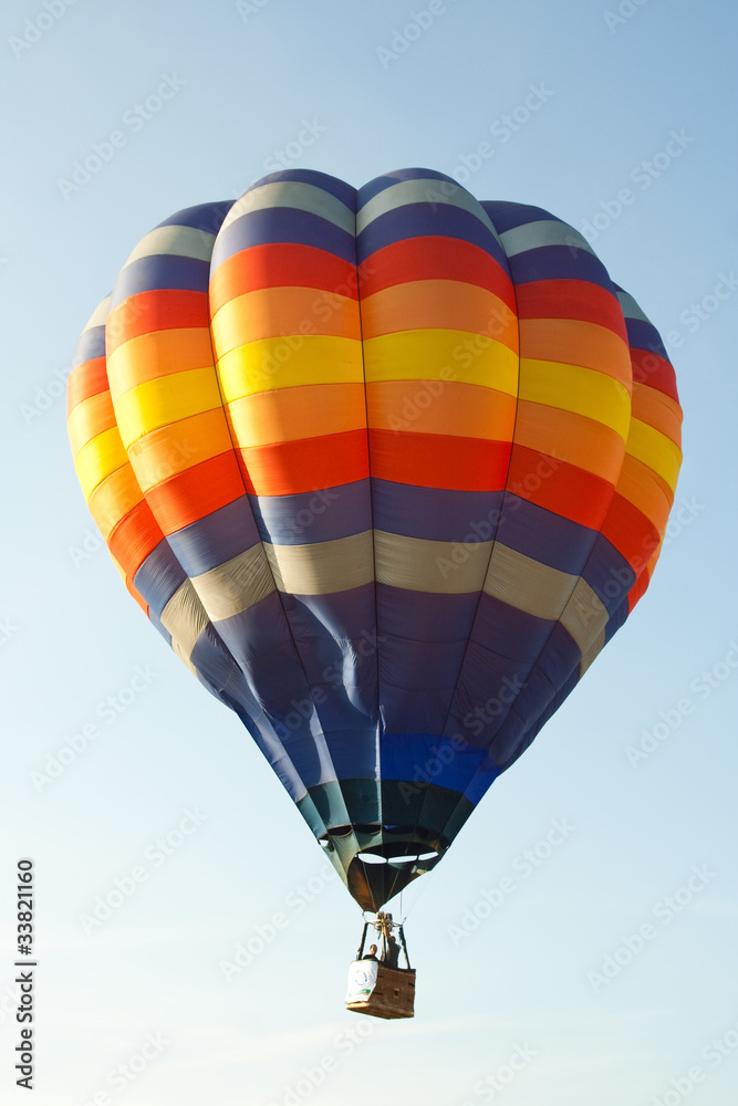 Naklejka premium Colorful hot air balloon on blue sky