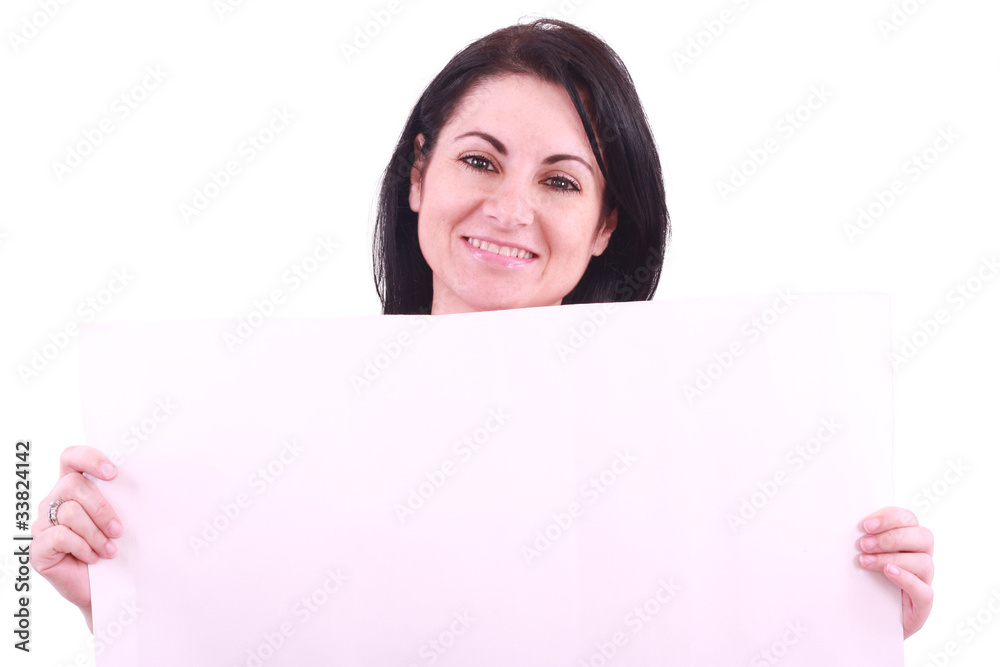 Portrait of woman holding a blank billboard . Portrait of woman holding a blank billboard .